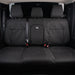 the back seats of a car with black cloth