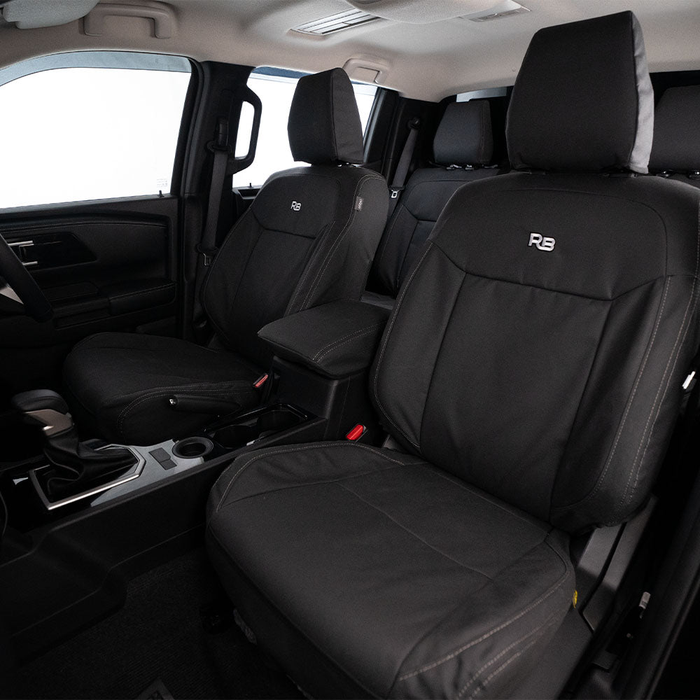 the interior of a vehicle with black leather seats