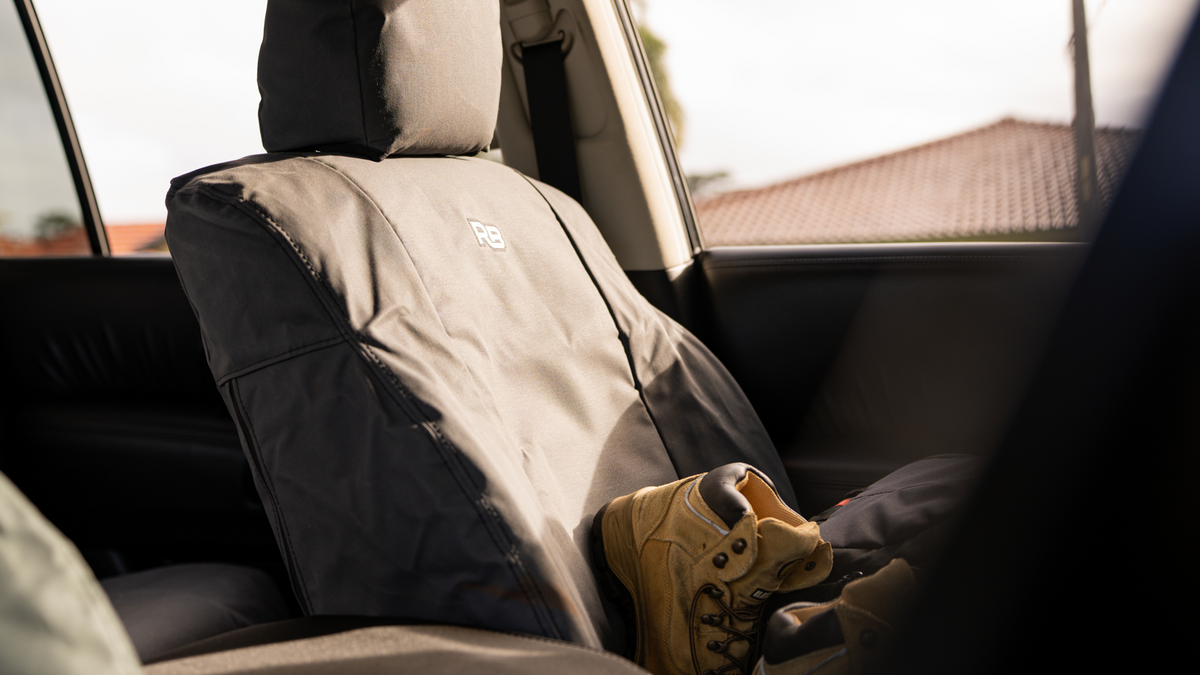 Razorback 4x4 front seat covers in grey canvas with workboots