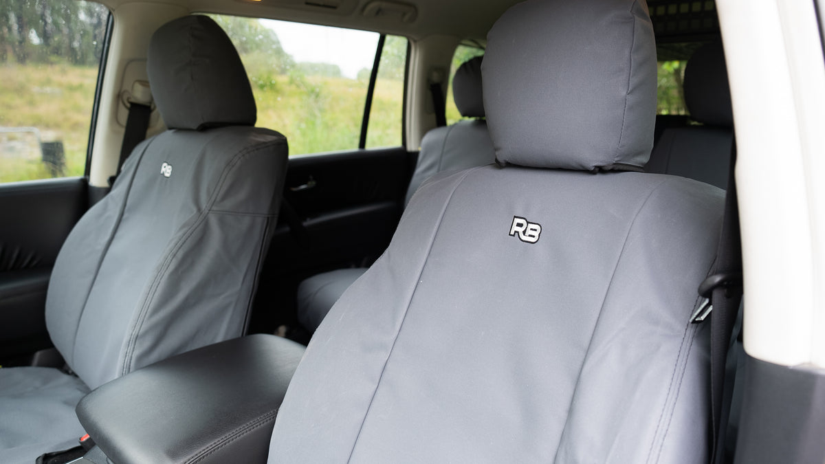 Razorback 4x4 front seat covers in clean grey canvas fitted in a vehicle
