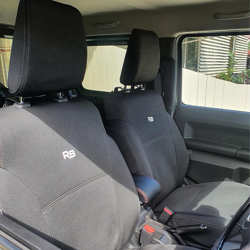 Photo of Razorback 4x4 neoprene front seat covers in a Suzuki Jimny